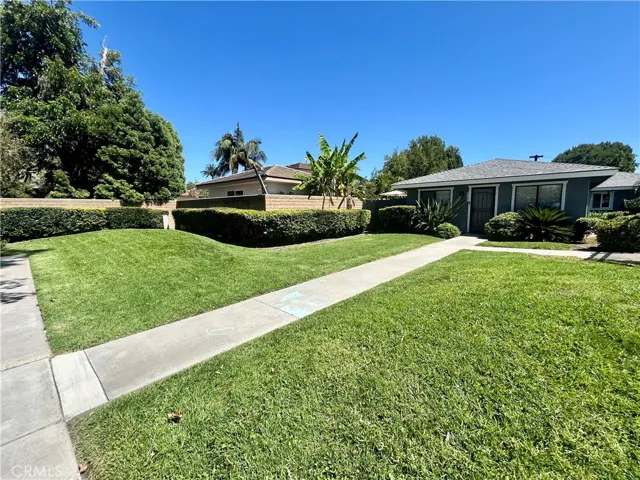 Private Entry with large greenbelt in your front yard.