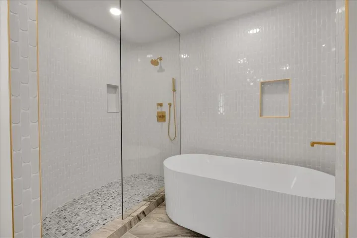 Primary Bathub and separate shower