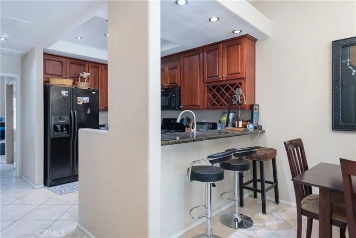 Kitchen open to dining room with Breakfast bar
