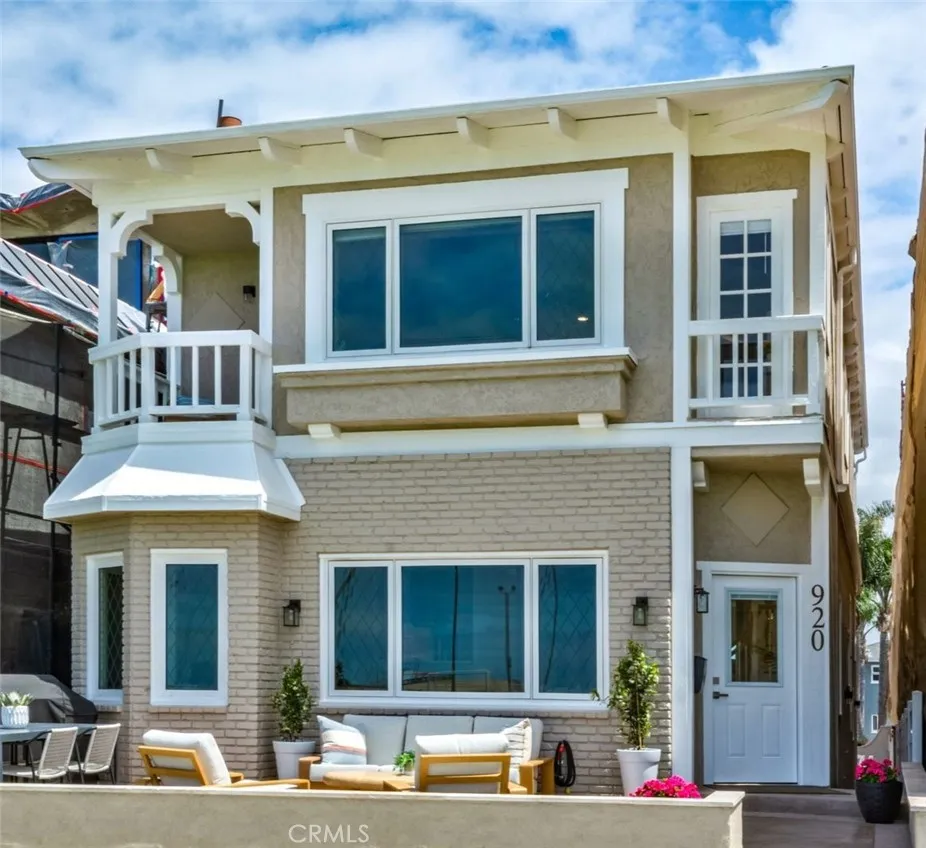 The extra large front patio is ideal for outdoor dining and additional living space