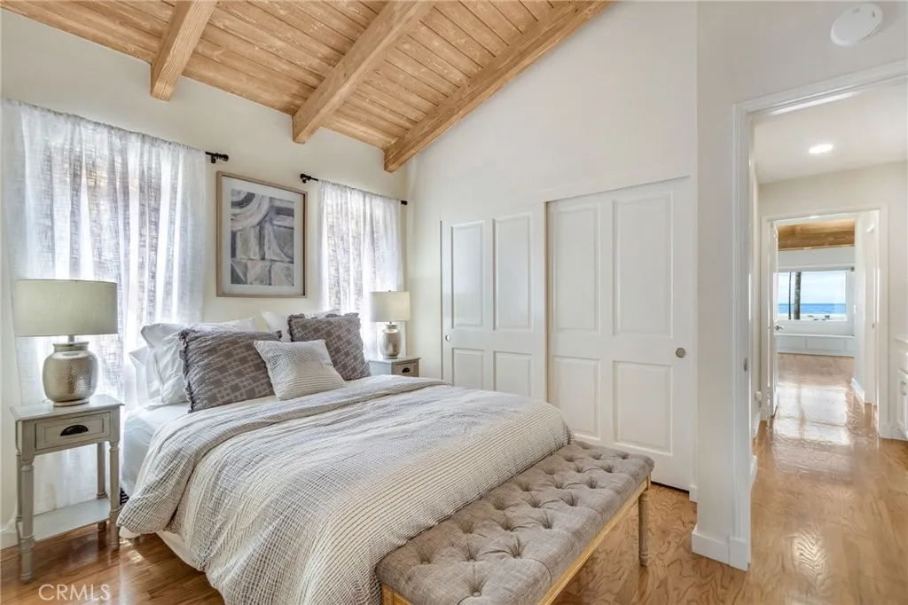 Guest bedroom with adjacent bonus room
