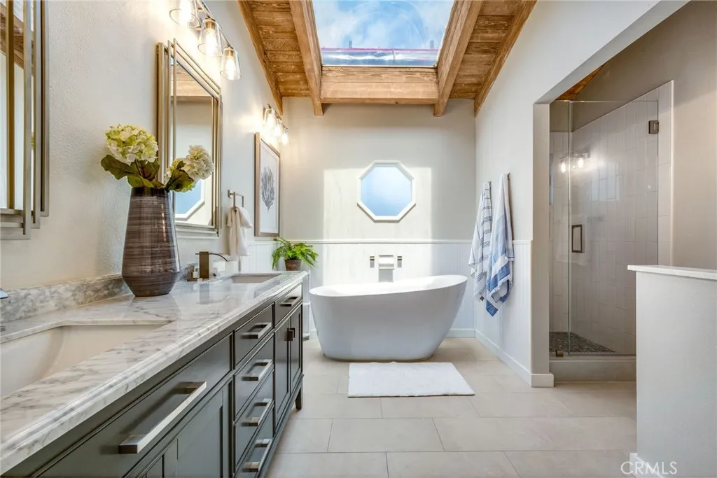 Beautiful primary bath is like a spa retreat