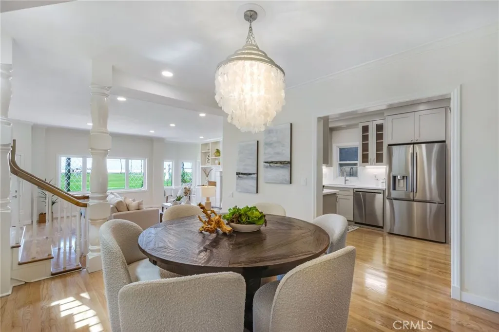 Elevated dining room, open to the kitchen and living room