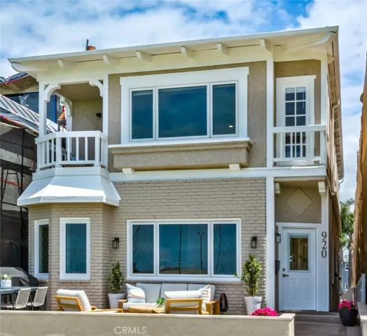 The extra large front patio is ideal for outdoor dining and additional living space