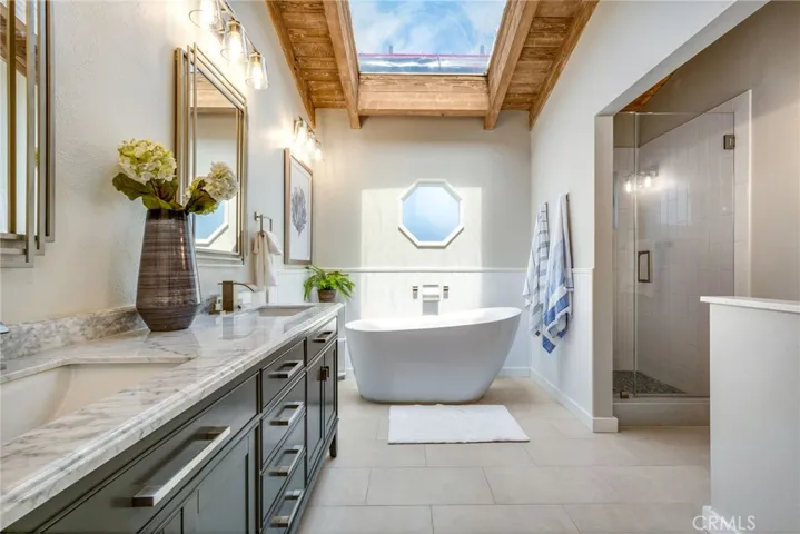 Beautiful primary bath is like a spa retreat