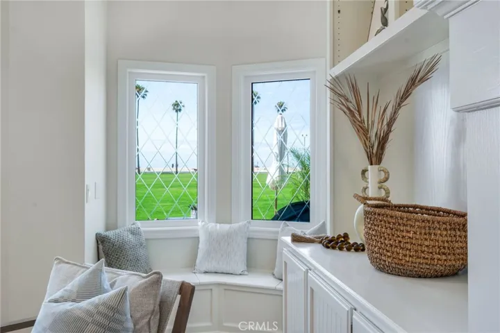 Charming window seat ready for reading or a fun board game