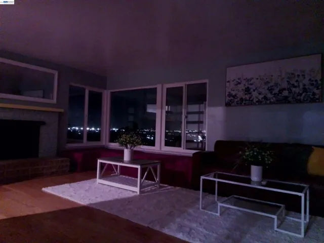 view of city lights from living room