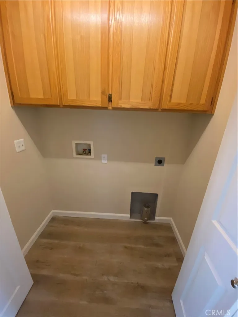Laundry closet in hallway.