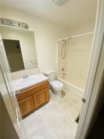 Hall bath with shower over tub.