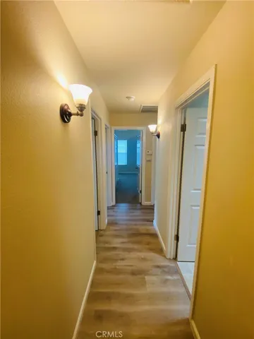 Hall with classic wall sconces.