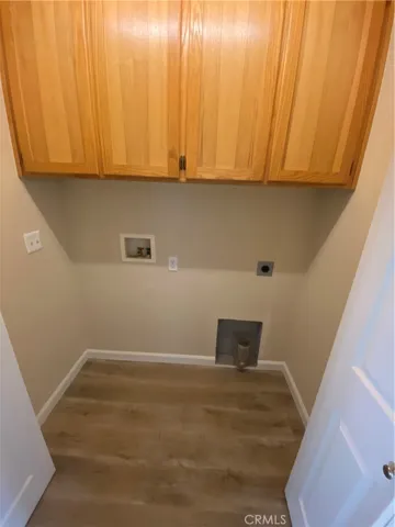 Laundry closet in hallway.