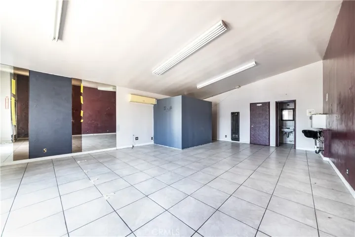 Inside view of unit 13177 Paramount Blvd. Photo taken facing the rear of the unit.