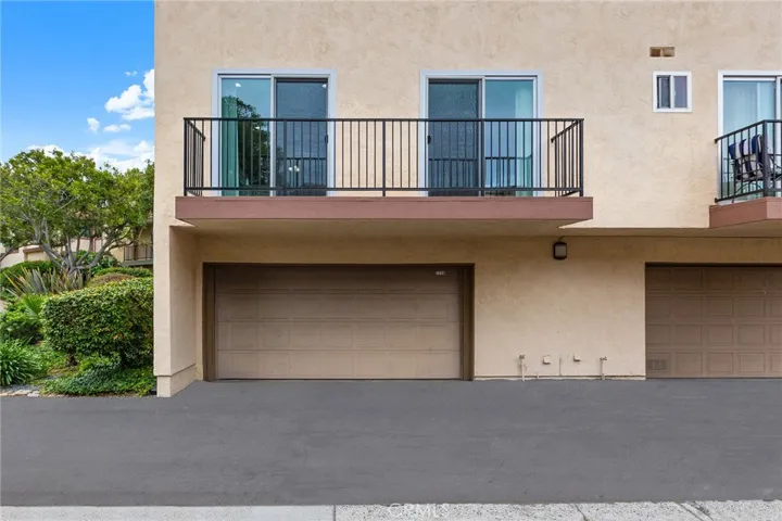 Two car garage and one of the balconies