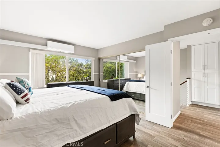 Double Entry, AC comfort,  mirrored closet and great light!