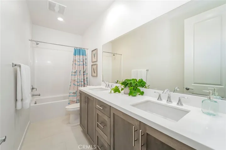 Dual vanity secondary bath