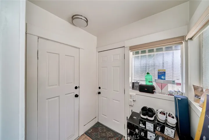 FIRST FLOOR HALLWAY TO BEDROOM & BACKYARD