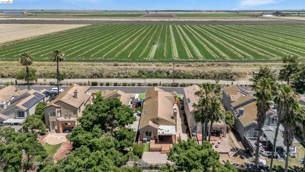 Residential community bordering extensive agricultural fields