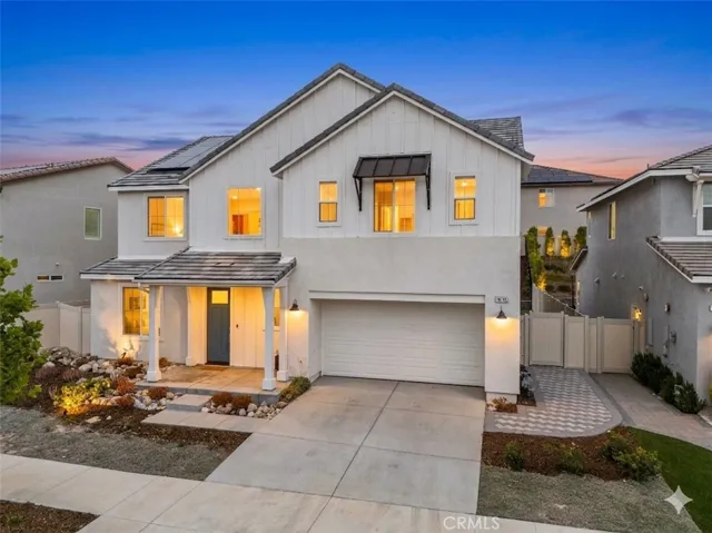 beautiful front exterior with porch **virtual twilight