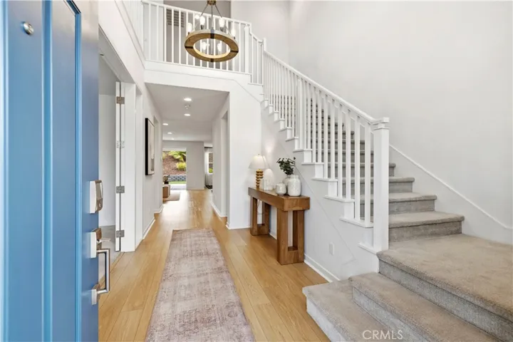 beautiful entry with vaulted ceilings