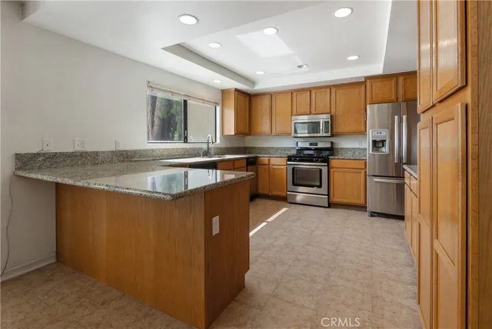 Kitchen with breakfast bar.