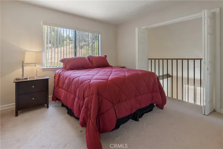 Upstairs bedroom above living room