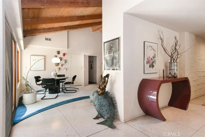 Sitting area to den and three bedrooms