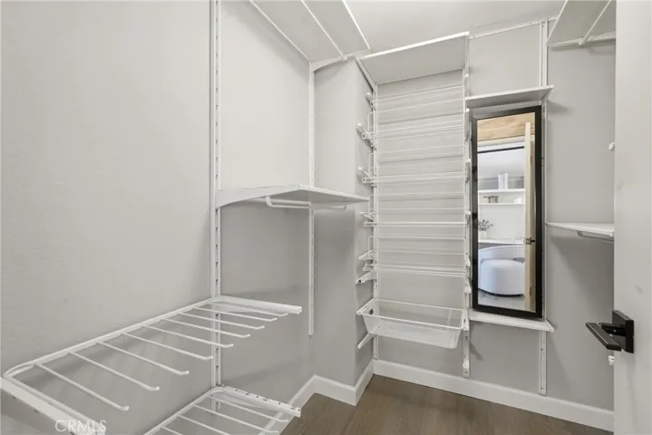 Primary suite walk in closet.