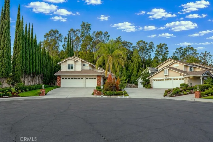 Quietly tucked at the end of a West Hills cul-de-sac, this nearly 2,000 sq. ft. home feels bright, welcoming, and instantly comfortable from the moment you walk through the door. The front yard is landscaped with colorful flowerbeds, mature succulents, cactus, a rose hedge, and a covered front porch perfect for morning coffee or relaxing evenings.