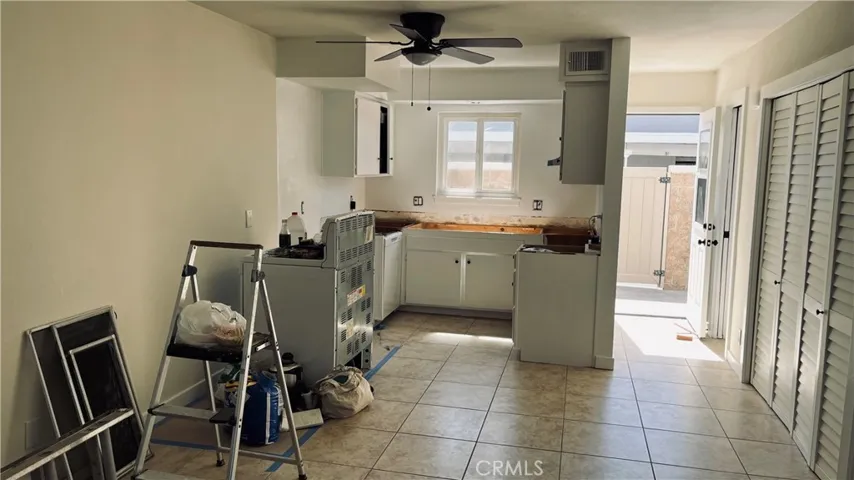 Please excuse the tools.Kitchen has a dishwasher and will soon have new countertops, new refrigerator and new electric range.