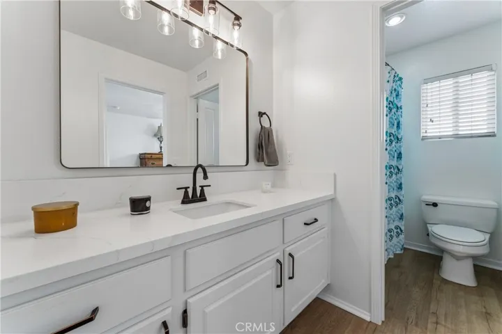 Renovated upstairs bathroom featuring modern finishes and fixtures.