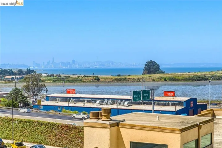 Expansive water scenery with distant city skyline