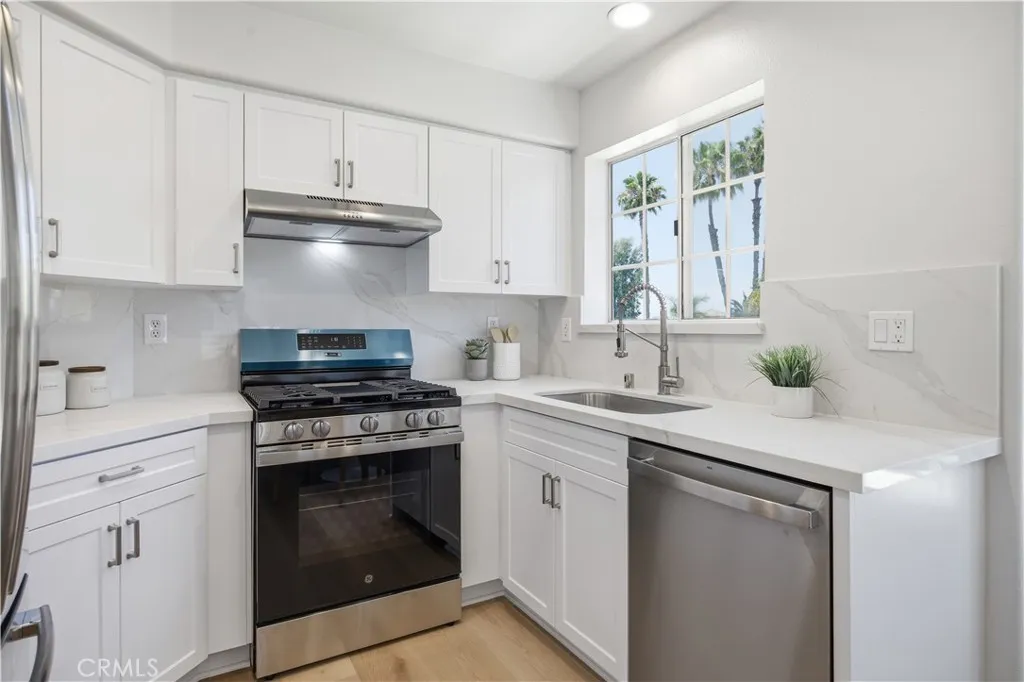 Brand new cabinets, countertops, stainless steel appliances.