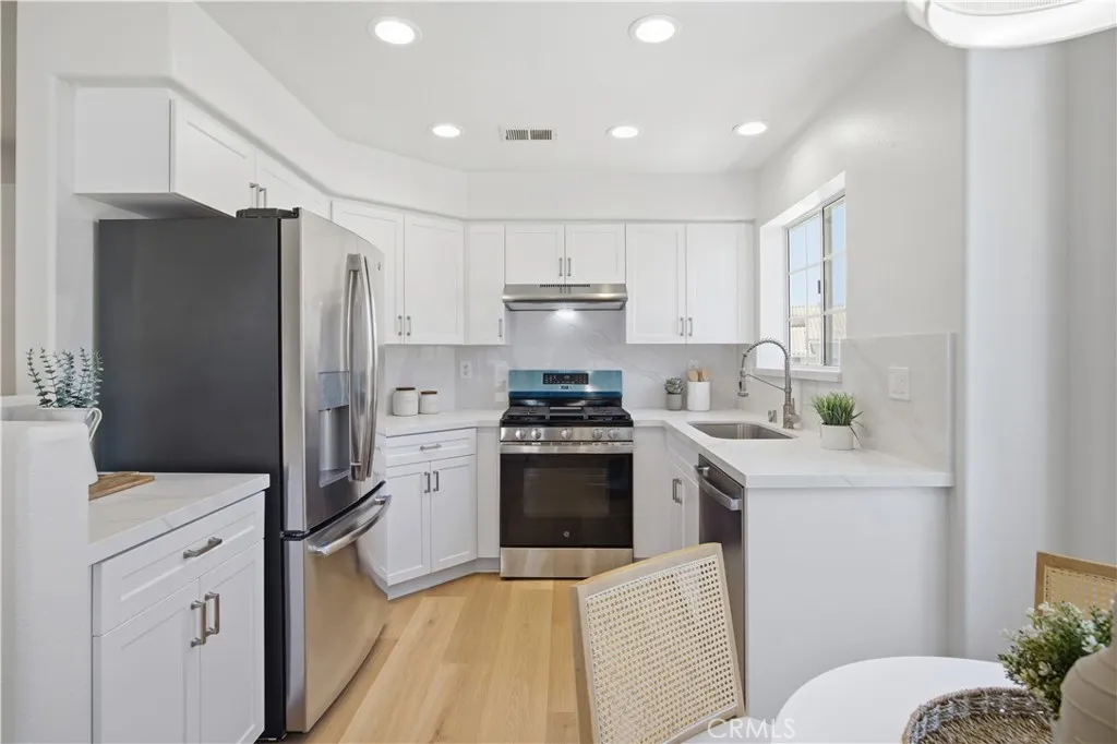 Brand new cabinets, countertops, stainless steel appliances.