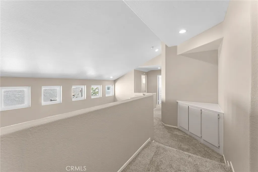 Stair landing with lots of storage.