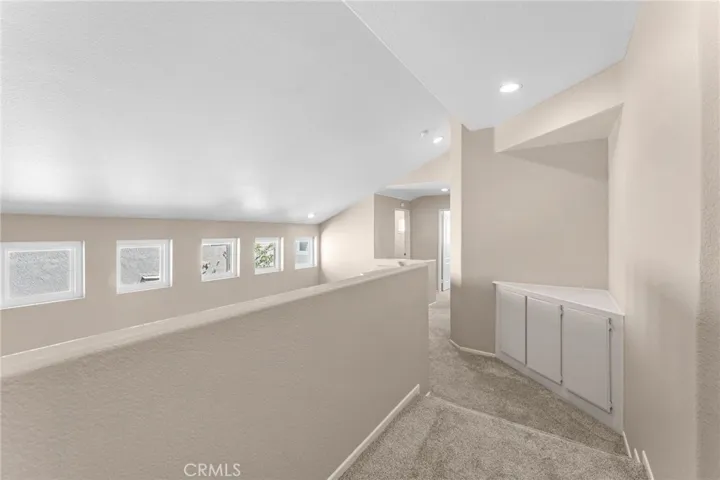 Stair landing with lots of storage.
