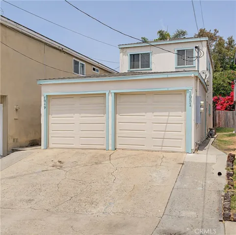 Garage and Driveway Provide Extra Parking