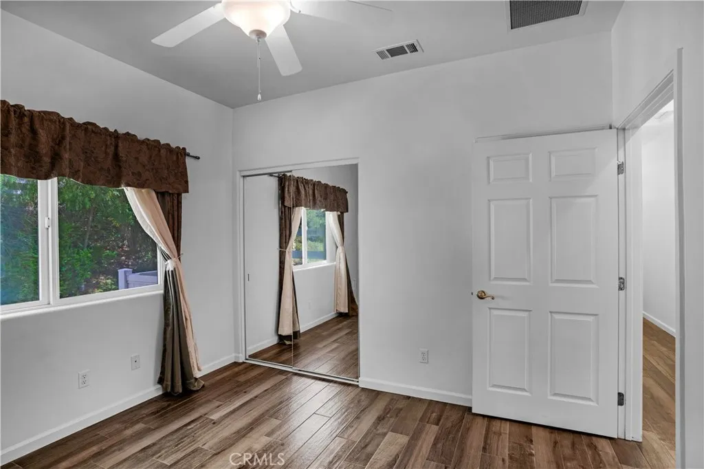 Bedroom with view of back yard