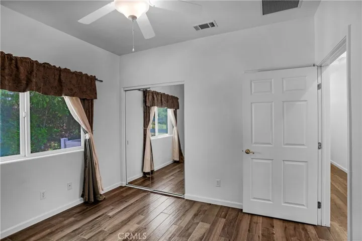 Bedroom with view of back yard