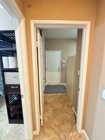 Hallway to laundry room and garage