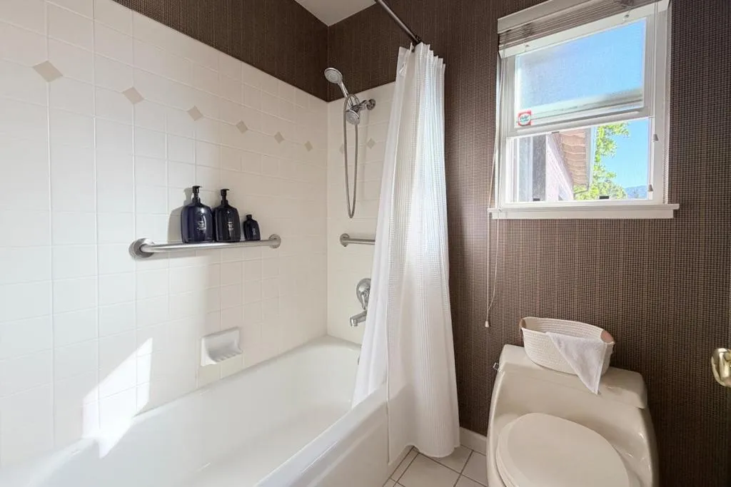 Bathroom with dual-sink vanity.