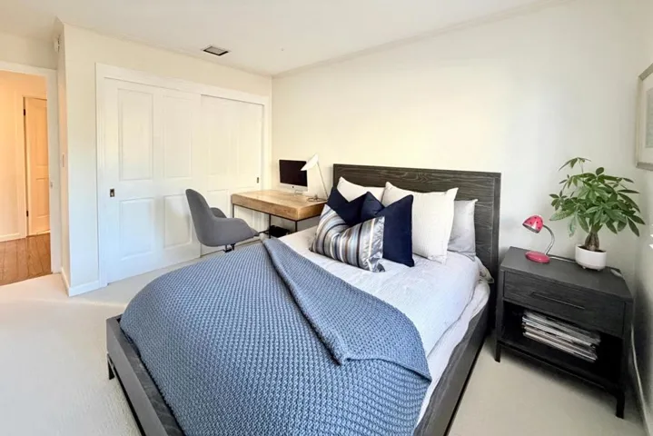 Third bedroom with closet and natural light.