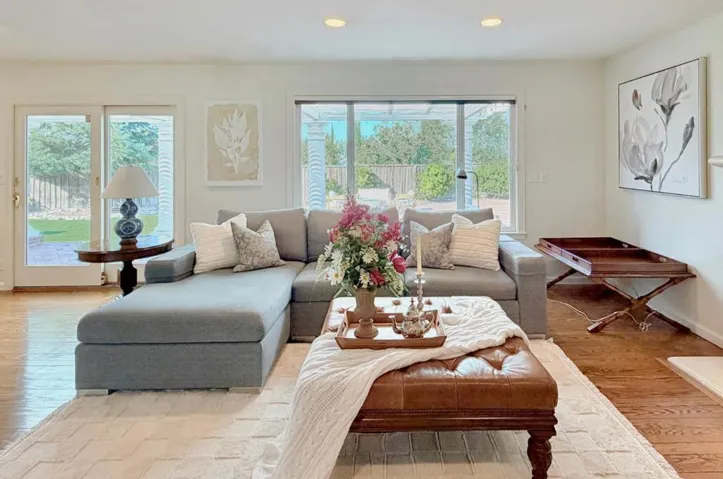 Family room with fireplace and recessed lighting.