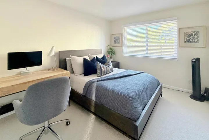 Third bedroom with closet and natural light.