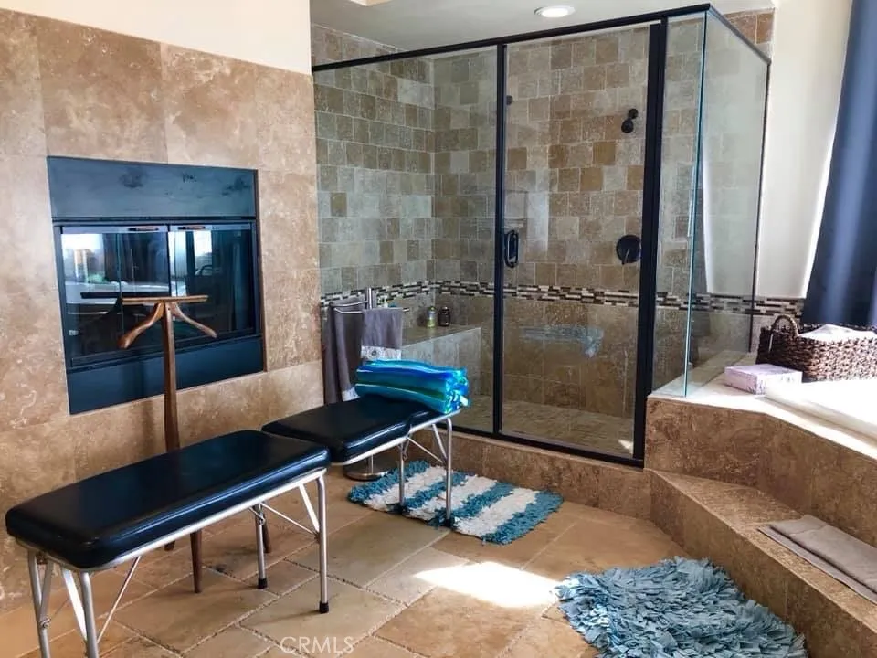master bathroom with fireplace