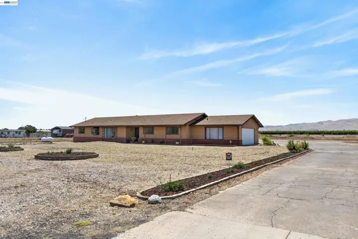Main House plus 5.03 acres and an additional unit.