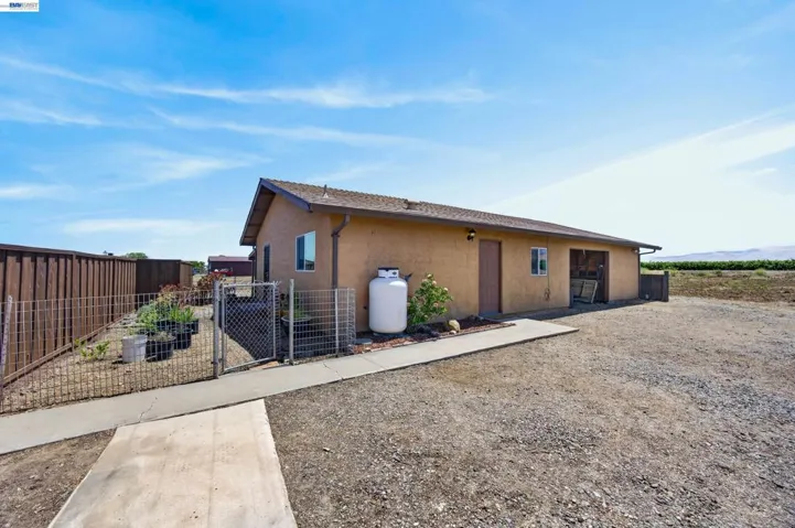 second unit, garage and space for horses.