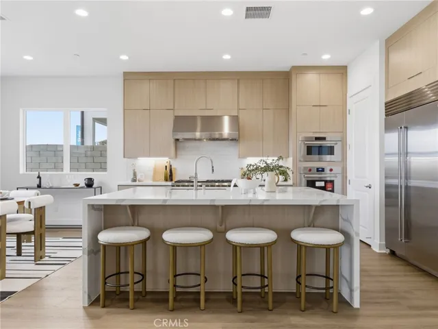 Kitchen: Merle Prairie Inspired - Skylar at FivePoint Valencia - Photos of another homesite - Not actual home for sale - Photos have similar finishes/selections of homesite 58