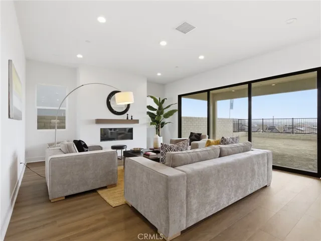 Living Room: Merle Prairie Inspired - Skylar at FivePoint Valencia - Photos of another homesite - Not actual home for sale - Photos have similar finishes/selections of homesite 58