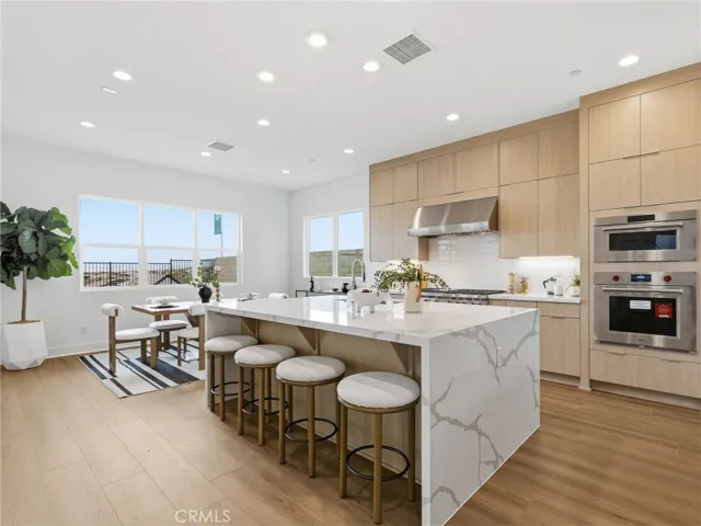 Kitchen: Merle Prairie Inspired - Skylar at FivePoint Valencia - Photos of another homesite - Not actual home for sale - Photos have similar finishes/selections of homesite 58