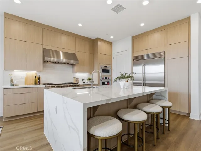 Kitchen: Merle Prairie Inspired - Skylar at FivePoint Valencia - Photos of another homesite - Not actual home for sale - Photos have similar finishes/selections of homesite 58